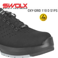 Black SWOLX safety boot, OXY-GRID 110 D S1PS, shown with yellow ESD emblem (close-up toe view)