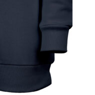 Close-up of a navy blue sweatshirt showing the ribbed cuff of the sleeve and the ribbed bottom hem.