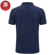 Rear view of a solid navy blue polo shirt with short sleeves and ribbed cuffs.