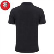 Back view of a plain black polo shirt with short sleeves on a white background.