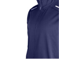 Close-up of a navy blue zip-up jacket with a high collar and white reflective details on the shoulders, shown from the chest area.