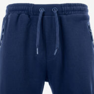 Close-up of navy sweatpants waistband with an elastic band and drawstrings