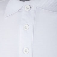 Close-up of a white polo shirt showing the button placket and collar detail.