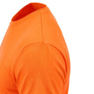 Close-up of an orange T-shirt showing the shoulder seam and smooth fabric texture, bright and vivid color.