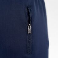 Close-up of a navy fabric zipper on a pocket, the metal pull marked 3B STOCK visible.