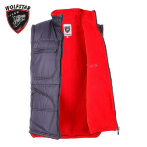 Navy quilted vest with bright red interior, zipper closure, multiple pockets, and a Wolfstar logo patch on the chest.