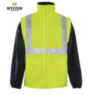 Neon yellow high-visibility safety vest with reflective stripes worn over a dark long-sleeve shirt.