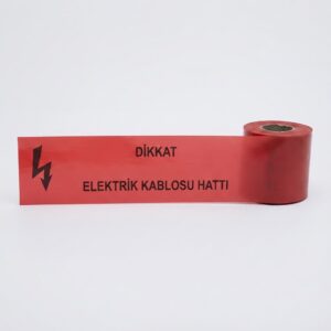 Red caution tape partially unrolled on a white surface, with the Turkish warning 'DİKKAT ELEKTRİK KABLOSU HATTI'.