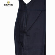 Close-up of dark navy work pants with zipper fly and side pocket, Staris Workwear logo in corner