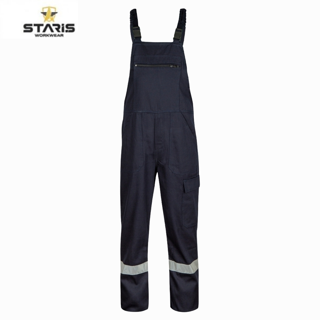 Navy work overalls with adjustable shoulder straps, a front zip pocket, a cargo pocket on the right leg, and reflective bands around the lower legs. The Staris Workwear logo is in the top left corner.