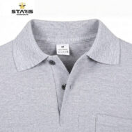 Close-up of a grey polo shirt showing collar and two-button placket; Staris Workwear logo in the top-left corner.