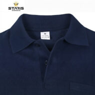 Navy polo shirt with collar and button placket, brand 'STARIS Workwear' logo in the top-left corner.