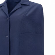 Close-up of a navy blazer showing the left chest pocket and lapel.