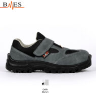Gray kids' safety shoe with Velcro strap and black rugged sole, steel-toe design (Çelik Burun).
