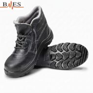 Black leather safety boot with padded collar and chunky tread sole; BMES logo in the top-left corner.
