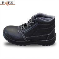 Black leather work boot with padded collar, white stitching, and rugged tread sole on white background.