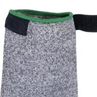 Close-up of a gray knitted pouch with a green rim and a black Velcro strap on the side.
