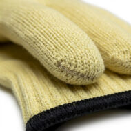 Pair of pale yellow knit gloves with a black ribbed cuff, close-up texture visible.
