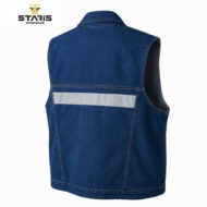 Denim sleeveless work vest with a horizontal reflective stripe on the back, branded STARIS Workwear.