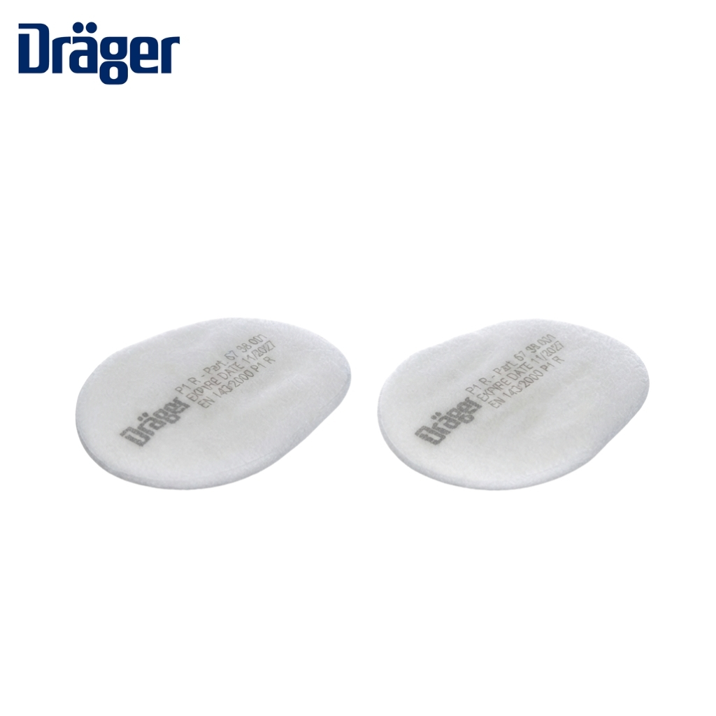 Two white oval medical pads, each with printed text, shown side by side (Dräger branding partially visible).
