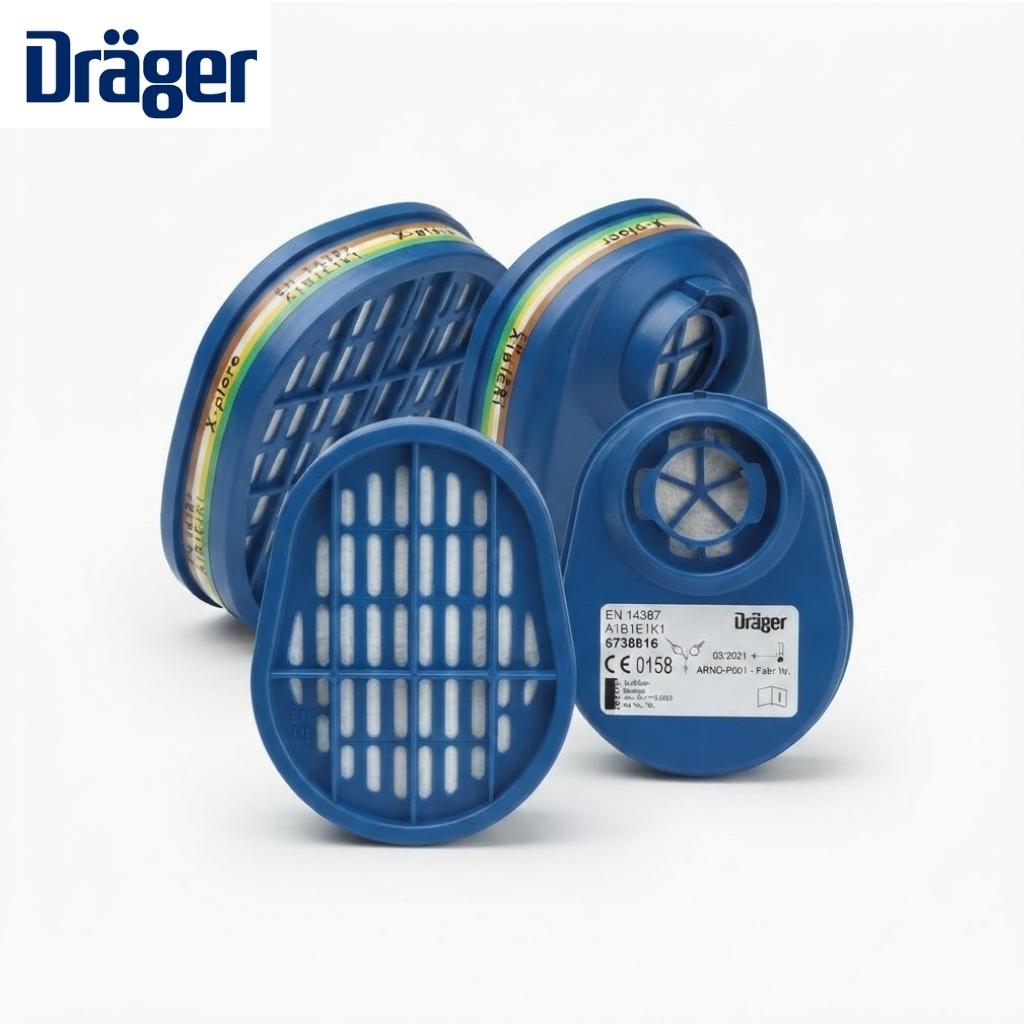 Pair of blue Dräger respirator filter cartridges with white pleated filter media and yellow-green bands at the rim, branding visible in corner.