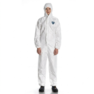 Person in a white protective coverall with hood, badge on the chest, standing against a white background with hands at sides.