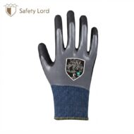 Grey protective glove with black-coated fingertips and blue knit cuff, displaying a 'Full Factor Double' label on the back of the hand.