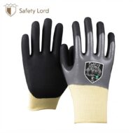 Pair of black and gray protective gloves with beige cuffs and a FullFire Double label on the back of one glove