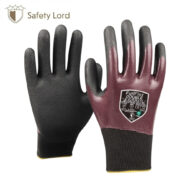Pair of coated work gloves: black palms, maroon backs with textured grip on fingers; Safety Lord branding in the corner.