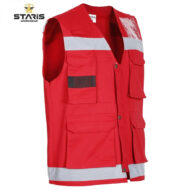 Red high-visibility safety vest with multiple pockets and reflective gray stripes for construction or outdoor work.