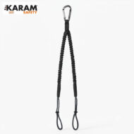 KARAM Safety logo in the top left with a black braided safety lanyard featuring a metal carabiner and two bottom loops against a white background; used for fall protection gear.