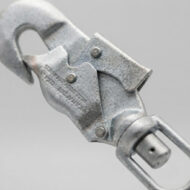 Close-up of a weathered metal locking plier (clamp) used to grip and hold objects momentarily (industrial tool).