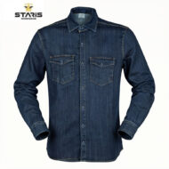 Dark blue denim shirt with a button-down front and two chest pockets on a light background, Staris Workwear logo in top-left.