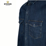 Dark blue denim shirt with button front and two chest pockets; Staris Workwear logo in the top-left corner.