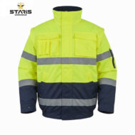 High-visibility neon yellow safety jacket with grey reflective bands, navy bottom, and multiple pockets (Staris Workwear).-