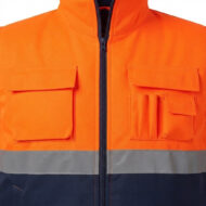Close-up of a high-visibility orange safety jacket with a front zipper, two chest pockets, and a gray reflective band around the waist.