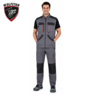 Male model wearing gray and black utility work vest and pants with multiple pockets, standing with hands in pockets; Wolfstar logo top-left.