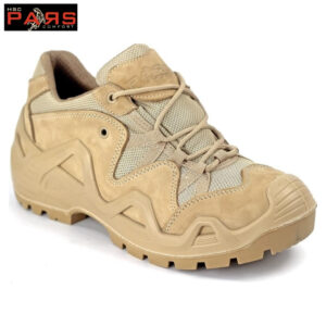 Beige rugged tactical boot with chunky tread sole, leather and mesh upper, and laced closure; angled side view highlighting durability.