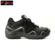 Black hiking shoe with a chunky tread sole and protective toe/heel, side view.