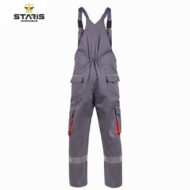 Grey industrial work overalls with adjustable straps, elastic waist, multiple cargo pockets with flaps, red zipper pulls, and reflective bands at the ankles; Staris Workwear logo in the corner.