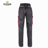 Dark gray work pants with multiple pockets and red side zippers, Staris Workwear brand logo in the corner.