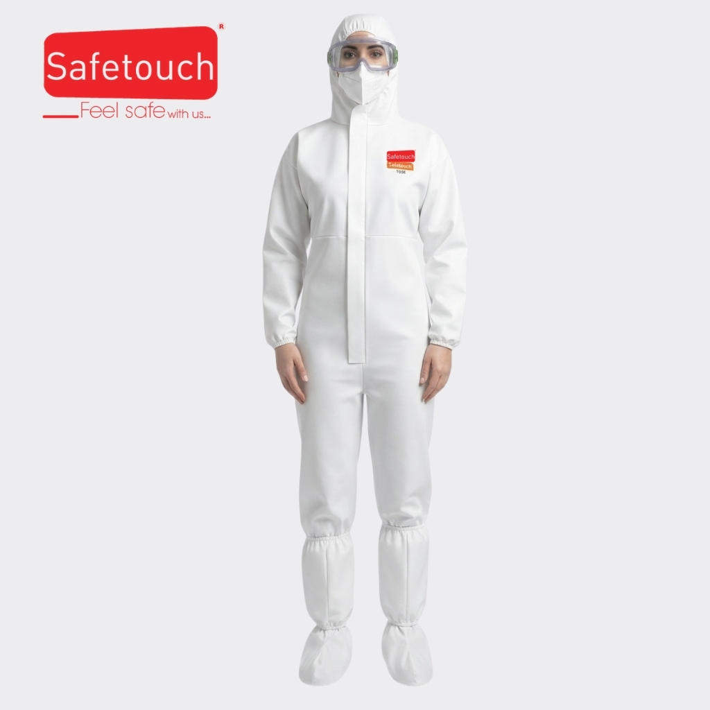 Person in white cleanroom coveralls with hood, goggles, and mask; Safetouch logo in the upper-left corner, indicating protective apparel for sterile environments