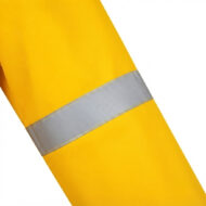 Close-up of bright yellow fabric with a reflective silver band around a sleeve, suggesting safety or high-visibility clothing.