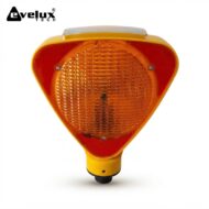 Amber triangular warning beacon light with a textured lens, mounted on a yellow base (Evolux Tech branding in corner). Follows visual safety indicator purpose for vehicles or machinery.