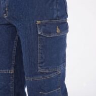 Blue denim cargo pant leg with a flap pocket secured by a metal button and yellow stitching detail on the seam