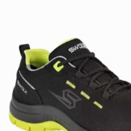 Black running shoe with neon lime lining and sole, gray logo on the side for contrast.