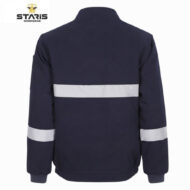 Back view of a navy work jacket with reflective horizontal band across the back and matching bands on the sleeves; Staris Workwear logo in the top-left corner.