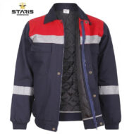 Navy workwear jacket with red yoke and light gray reflective stripes on chest and sleeves, front pocket, zip closure, and quilted inner lining.
