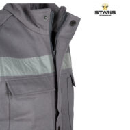 Close-up of a gray work jacket with a light reflective stripe, zipper and cargo pockets; Stars Workwear logo visible in the corner.