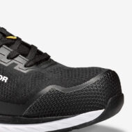 Close-up of a black athletic running shoe showing knit mesh upper, laces, and a textured outsole for grip.